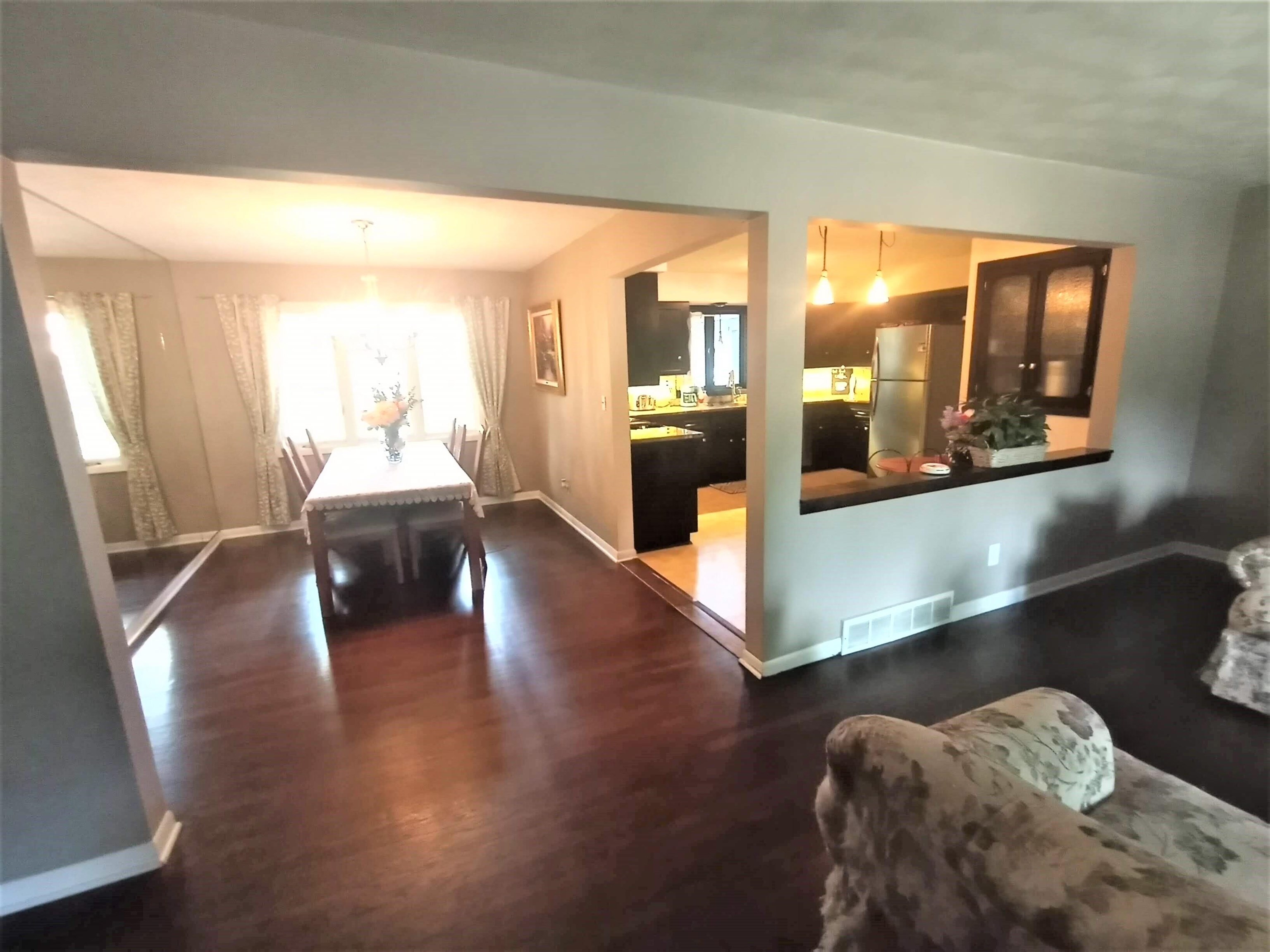 5242 Brookview Road Rockford, IL 61107 - Photo 8 of 44 a living room with furniture and a large window