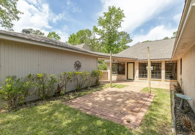 front view of a house with a garden