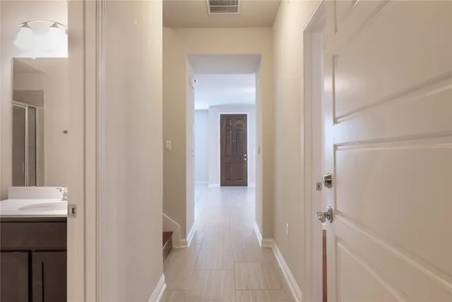 a view of entryway with wooden floor
