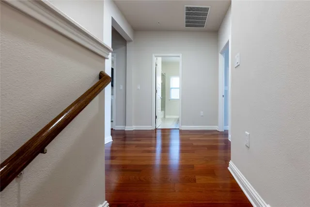 a bathroom with a double vanity sink mirror and