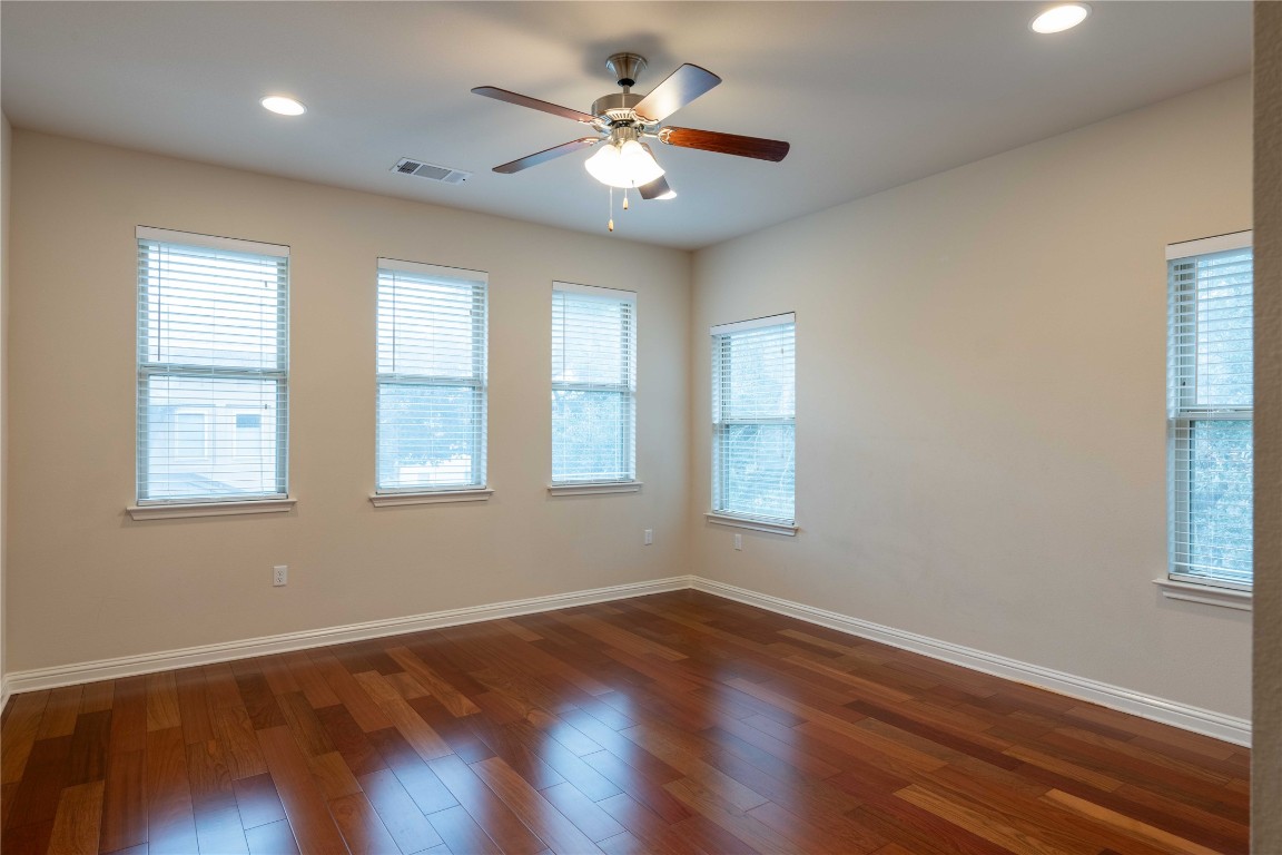 13800 Lyndhurst Street, Unit 281 Austin, TX 78717 - Photo 21 of 33 Master bedroom with beautiful wood floor.