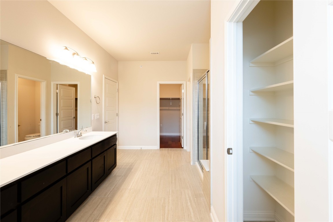 13800 Lyndhurst Street, Unit 281 Austin, TX 78717 - Photo 25 of 33 Master bathroom featuring huge linen closet.