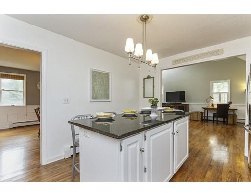 13 Oak Hill Street Pepperell, MA 01463 - Photo 11 of 30 a kitchen with a sink and stove