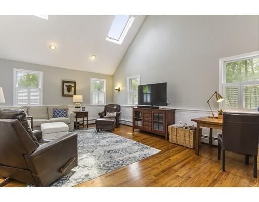 13 Oak Hill Street Pepperell, MA 01463 - Photo 13 of 30 a living room with furniture and a flat screen tv