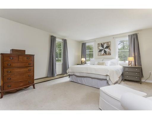 13 Oak Hill Street Pepperell, MA 01463 - Photo 17 of 30 a bedroom with a bed and a dresser