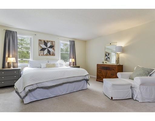 13 Oak Hill Street Pepperell, MA 01463 - Photo 18 of 30 a bedroom with bed and a couch