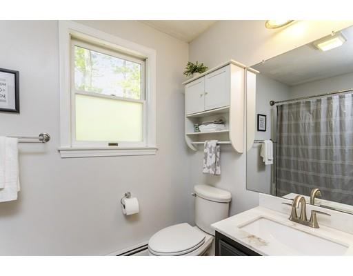 13 Oak Hill Street Pepperell, MA 01463 - Photo 23 of 30 a bathroom with a sink a toilet and a mirror