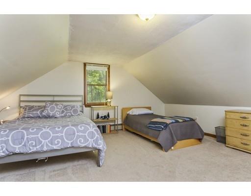 13 Oak Hill Street Pepperell, MA 01463 - Photo 25 of 30 a bedroom with a bed and window