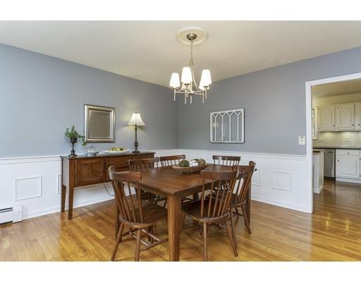 13 Oak Hill Street Pepperell, MA 01463 - Photo 9 of 30 a view of a dining room with furniture and wooden floor