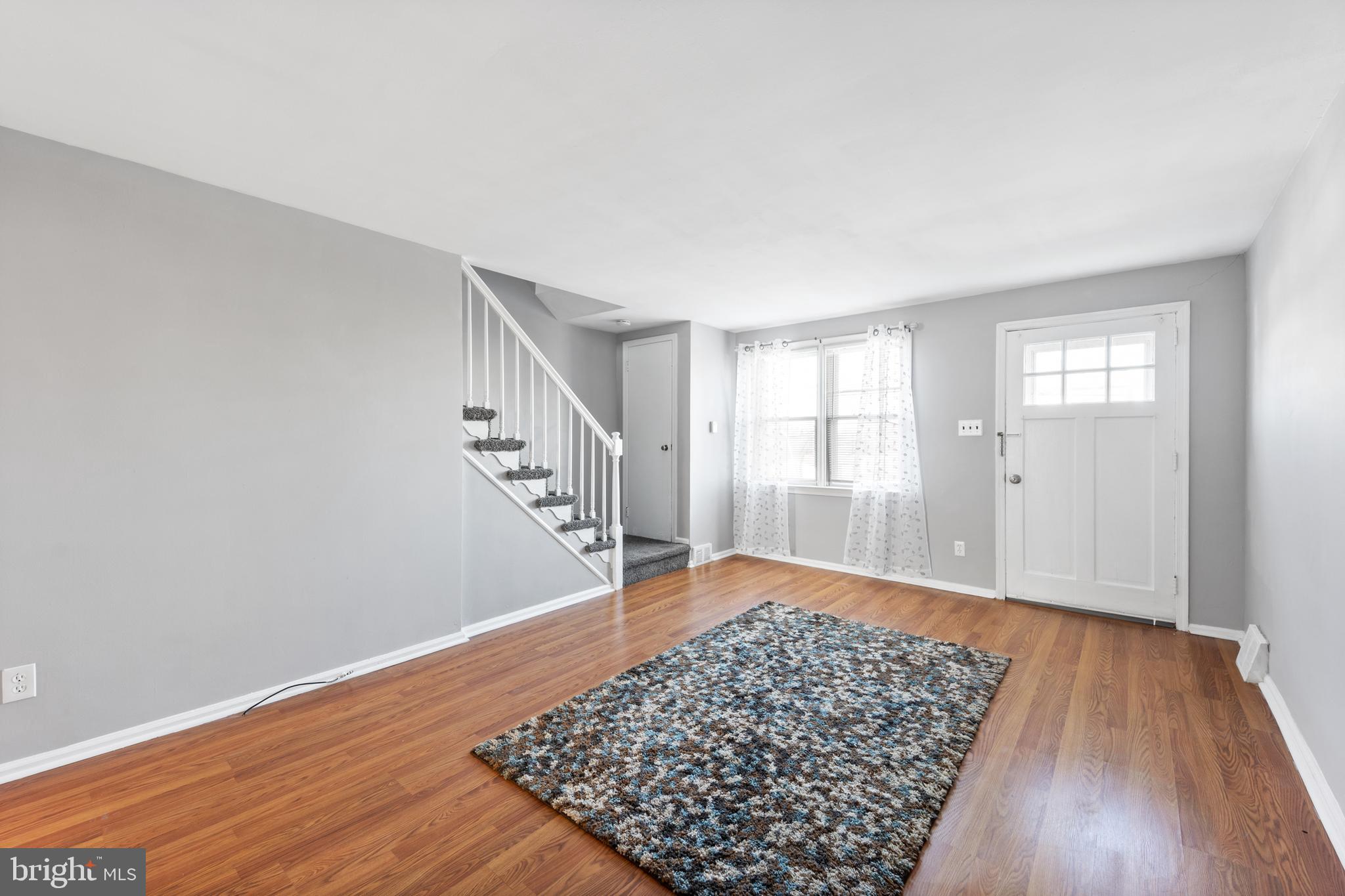 3006 Heather Road Folcroft, PA 19032 - Photo 6 of 25 wooden floor in an empty room with a window