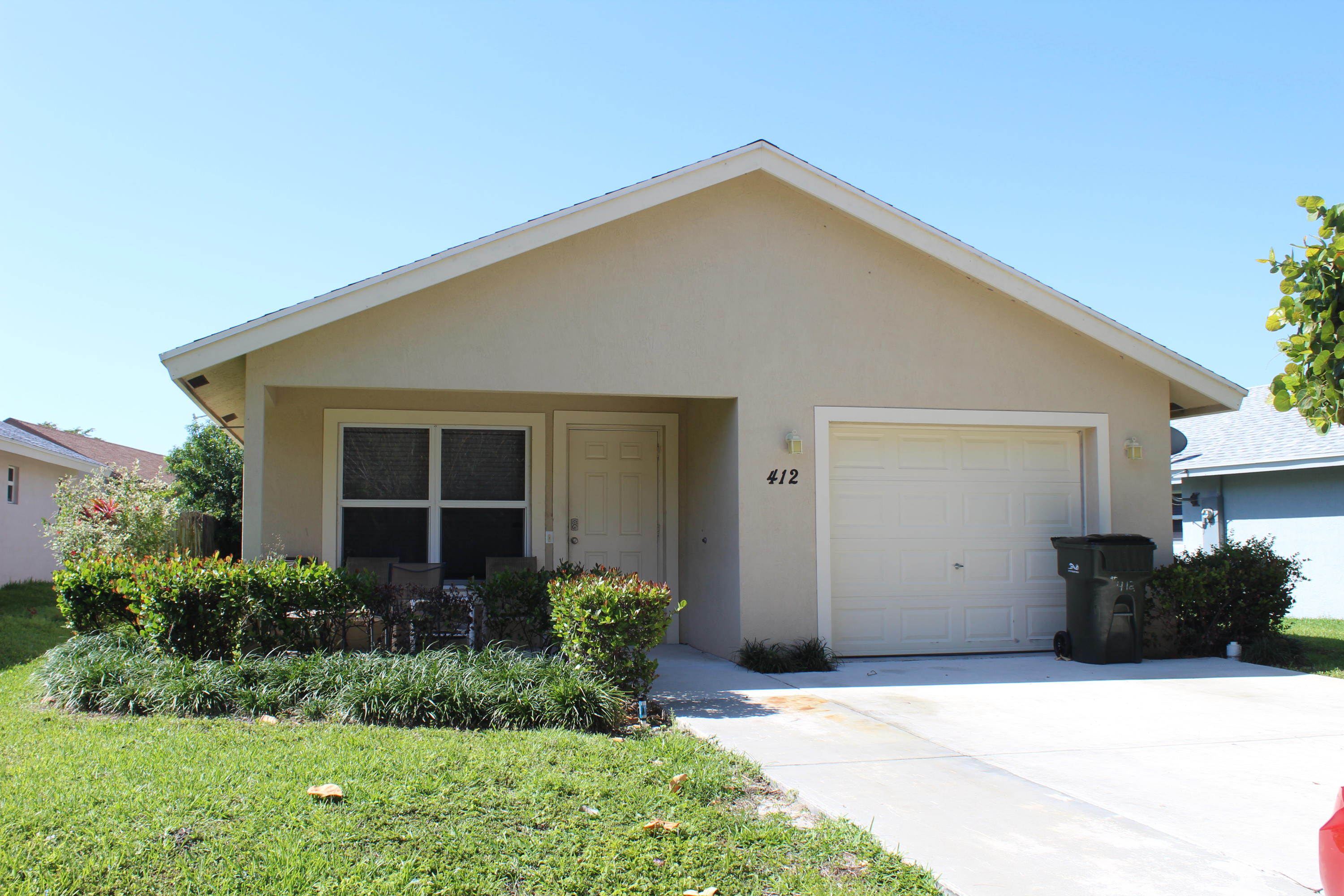412 Southridge Road Delray Beach, FL 33444 - Photo 1 of 19 Front Exterior