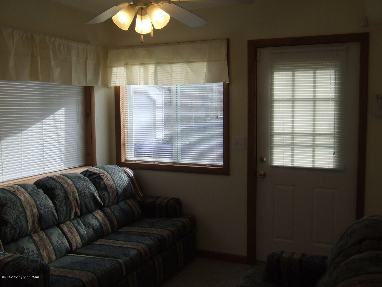 172 Bushkill Circle Bushkill, PA 18324 - Photo 7 of 31 a living room with furniture and a window