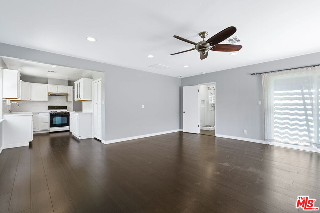 5343 Blanco Way Culver City, CA 90230 - Photo 17 of 30 a view of empty room with wooden floor and window