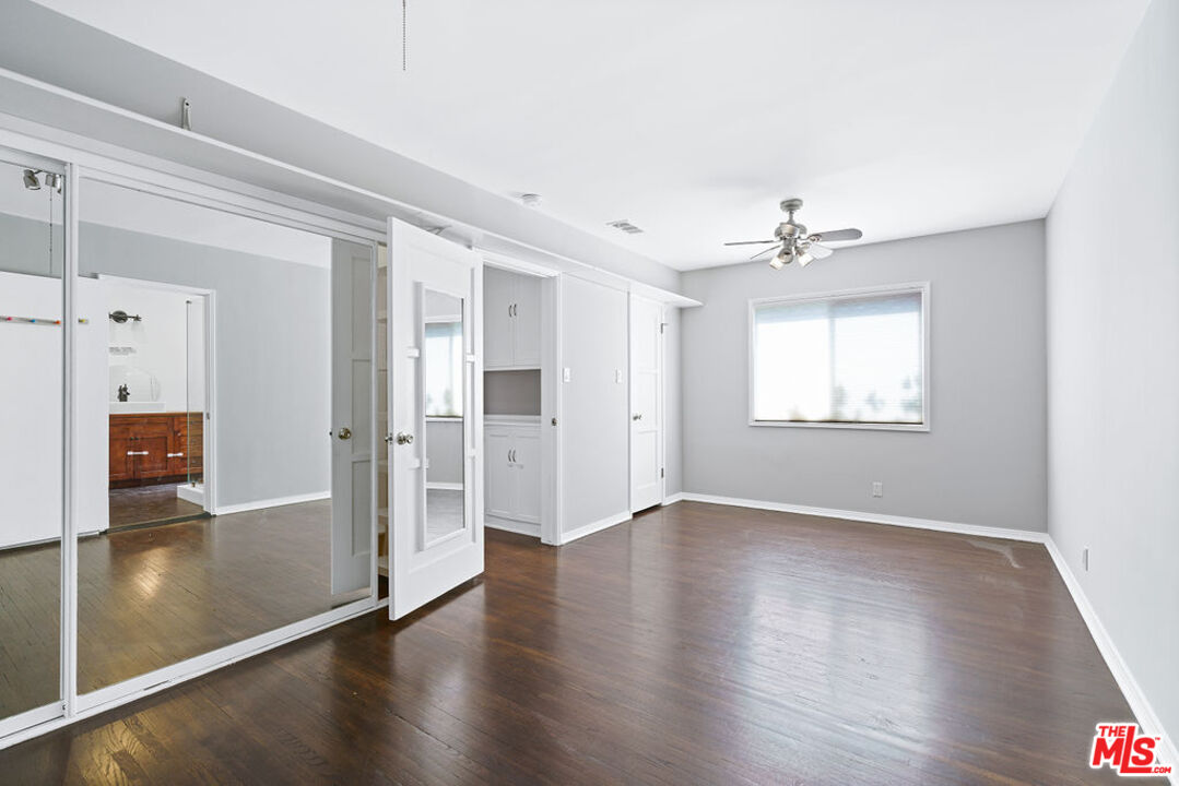 5343 Blanco Way Culver City, CA 90230 - Photo 26 of 30 a view of a hallway with wooden floor