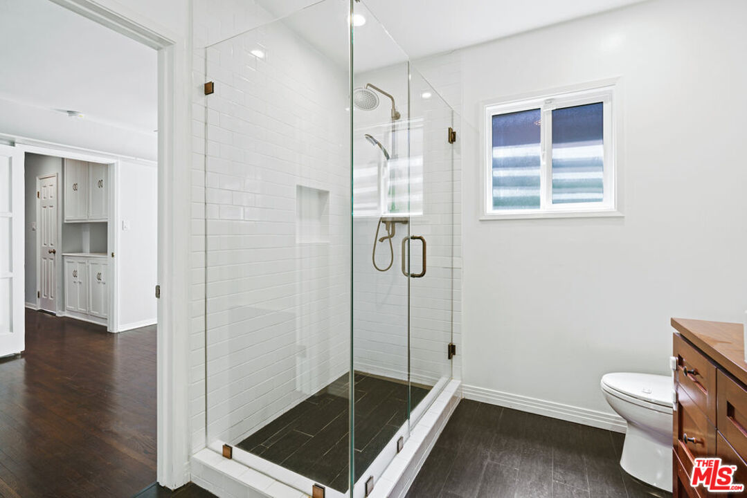 5343 Blanco Way Culver City, CA 90230 - Photo 27 of 30 a bathroom with a shower and toilet