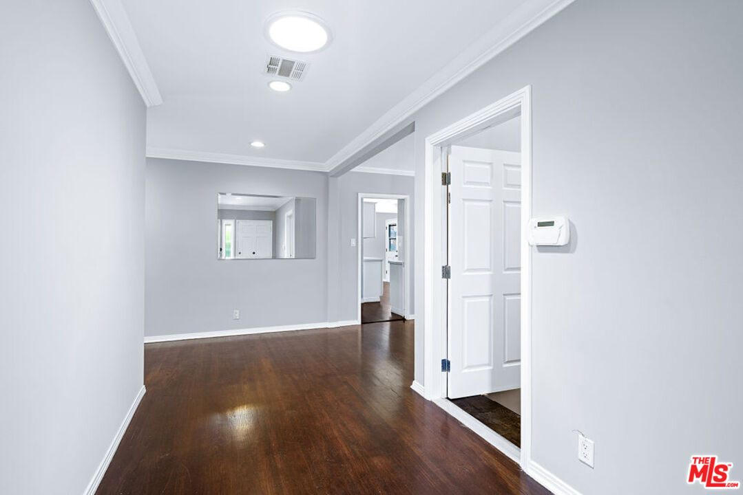 5343 Blanco Way Culver City, CA 90230 - Photo 3 of 30 wooden floor in an empty room with a window