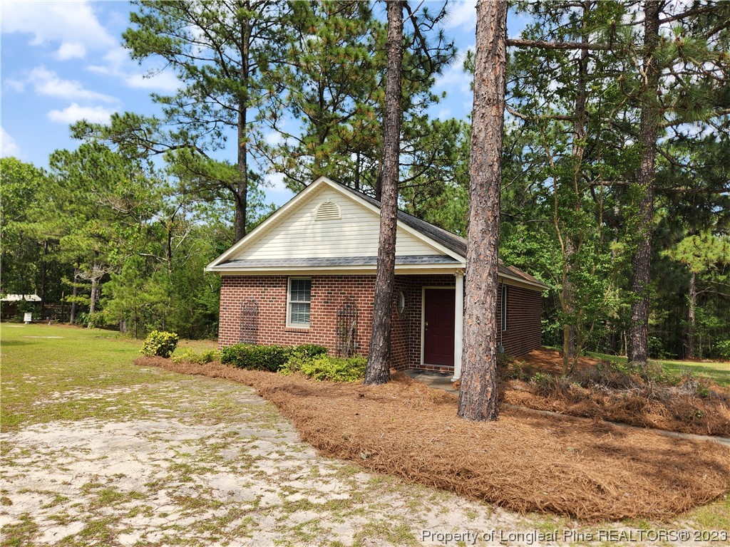 2730 Chimney Point Linden, NC 28356 - Photo 20 of 30 a front view of a house with a yard
