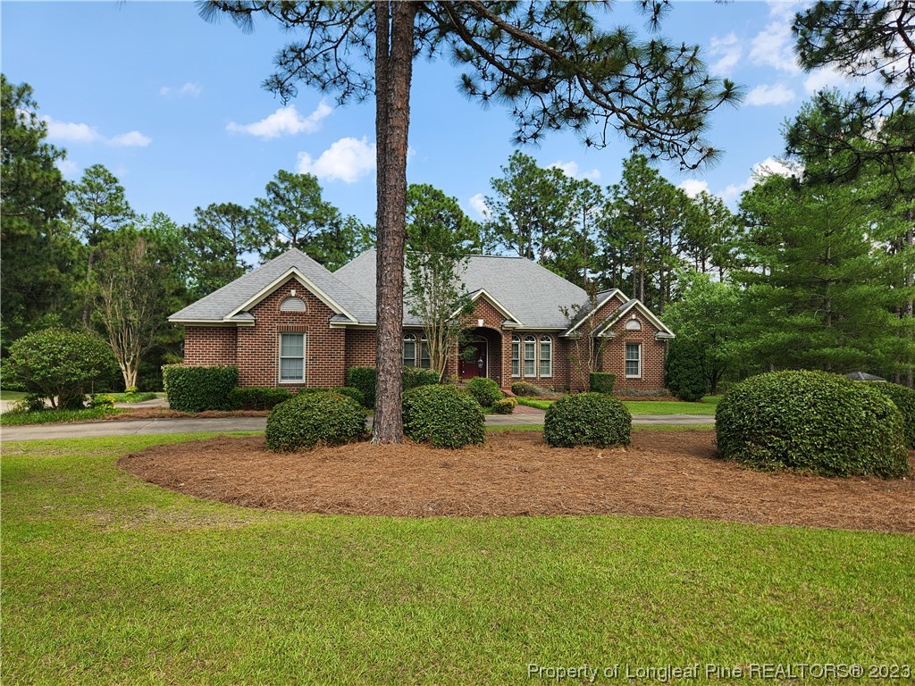 2730 Chimney Point Linden, NC 28356 - Photo 2 of 30 a front view of a house with garden