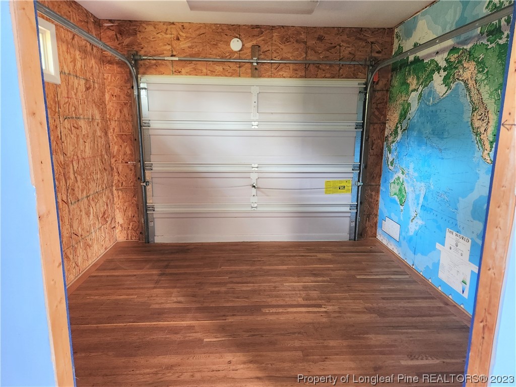 2730 Chimney Point Linden, NC 28356 - Photo 22 of 30 a view of walk in closet with clothes and shoes