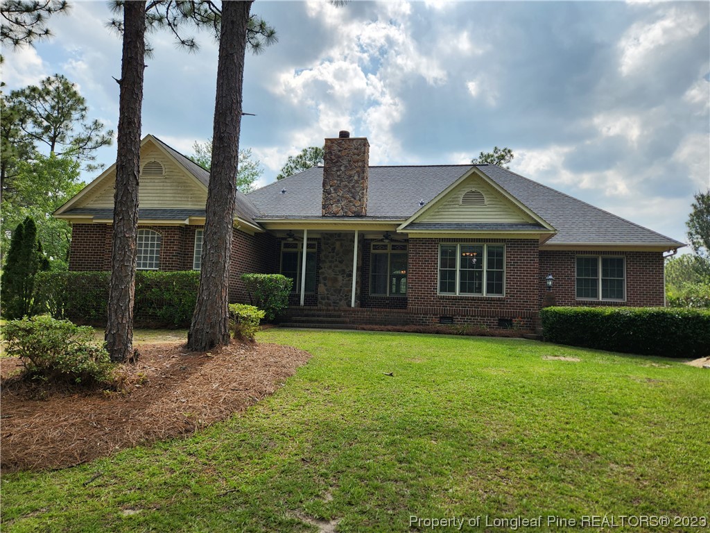 2730 Chimney Point Linden, NC 28356 - Photo 30 of 30 a front view of a house with garden