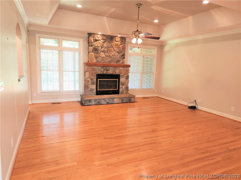2730 Chimney Point Linden, NC 28356 - Photo 3 of 30 a view of empty room with wooden floor and fireplace