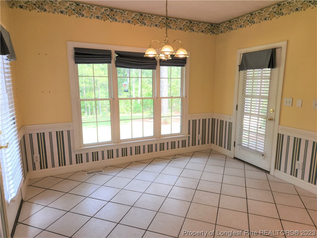 2730 Chimney Point Linden, NC 28356 - Photo 8 of 30 a view of an empty room and window