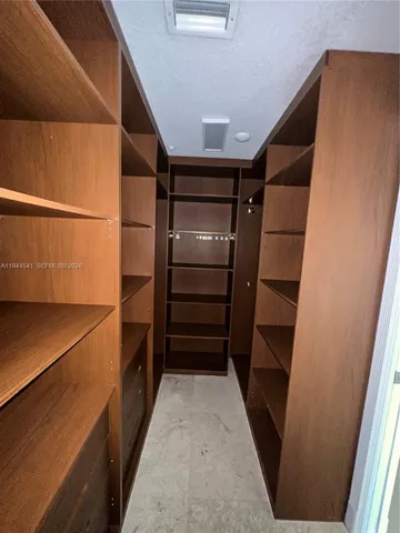 a bathroom with a shower and a toilet