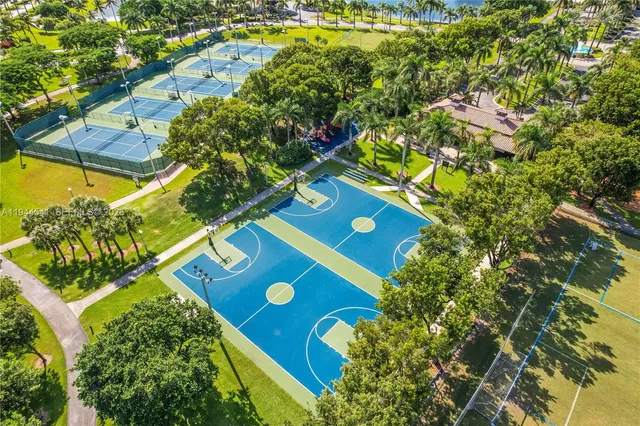 a swimming pool with outdoor seating and yard