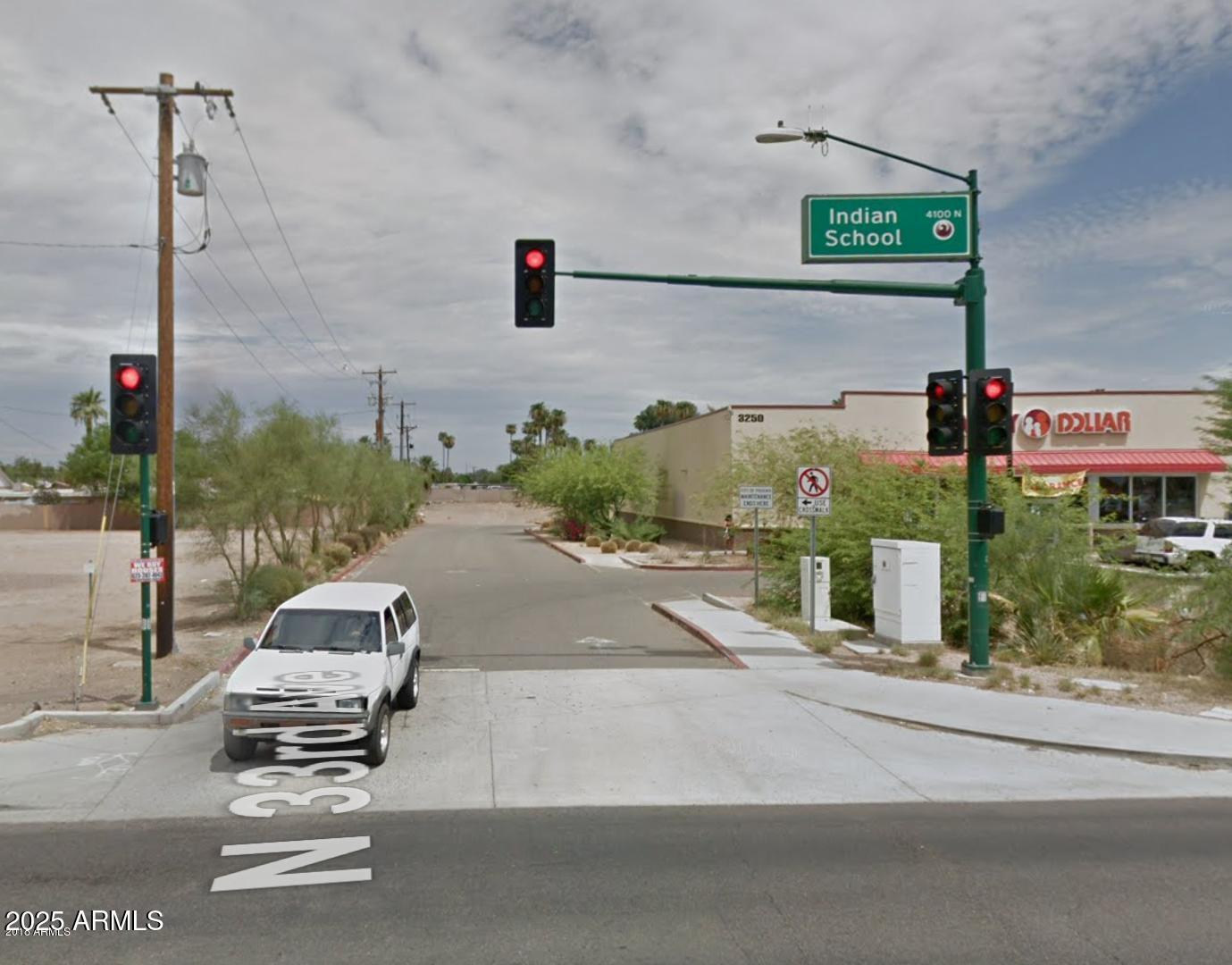3248 West Indian School Road Phoenix, AZ 85017 - Photo 5 of 11 a park view with a street sign on a road