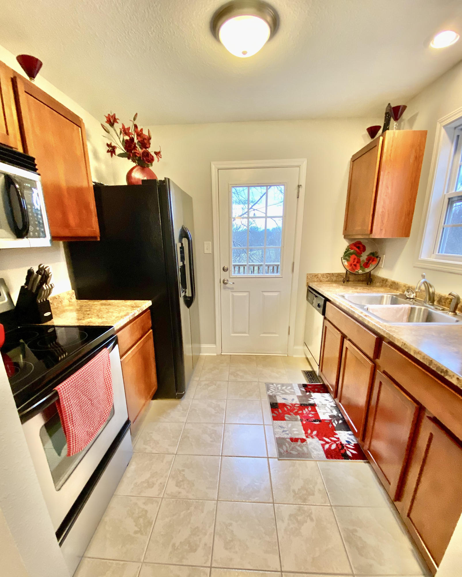 3054 George Light Road Knoxville, TN 37931 - Photo 13 of 36 Kitchen Opens to Main Level Deck