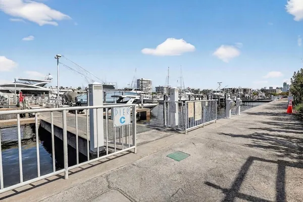 a view of a balcony with chairs