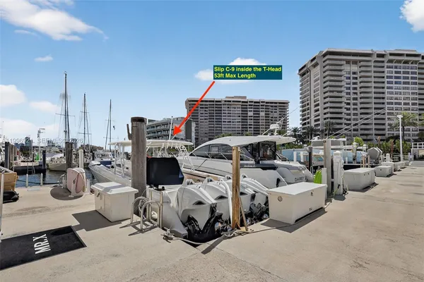 a roof deck with couches and a fireplace