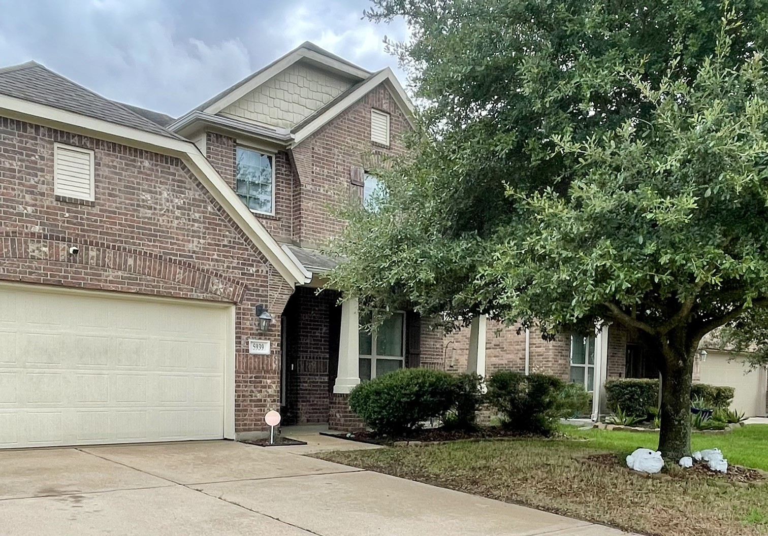 5939 Northcrest Village Way Spring, TX 77388 - Photo 2 of 12 a front view of a house with garden