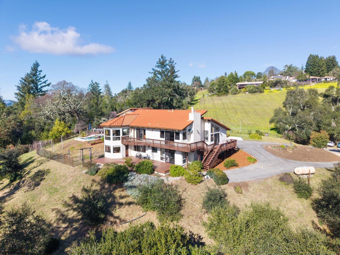 600 Ridge Top Road Los Gatos, CA 95033 - Photo 5 of 81 an aerial view of residential houses with outdoor space and trees
