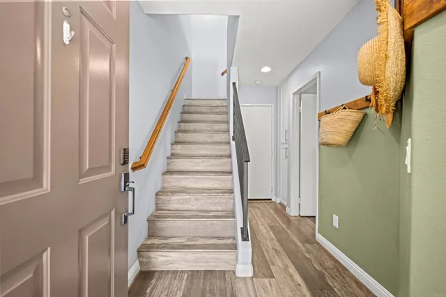 a living room with a bed and furniture