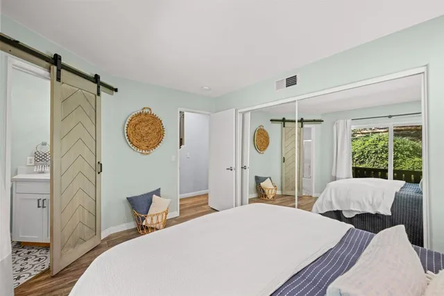 a kitchen with sink and refrigerator