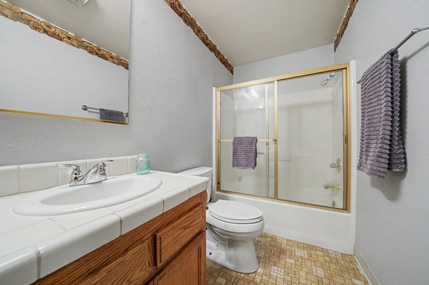 20310 State Rte 26 West Point, CA 95255 - Photo 32 of 57 a bathroom with a sink toilet and shower