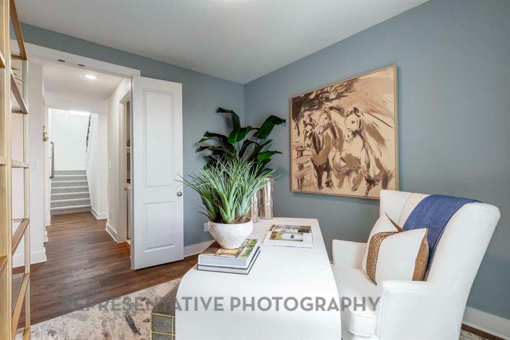 2140 Nerello Way Rockwall, TX 75032 - Photo 20 of 36 a living room with furniture and wooden floor