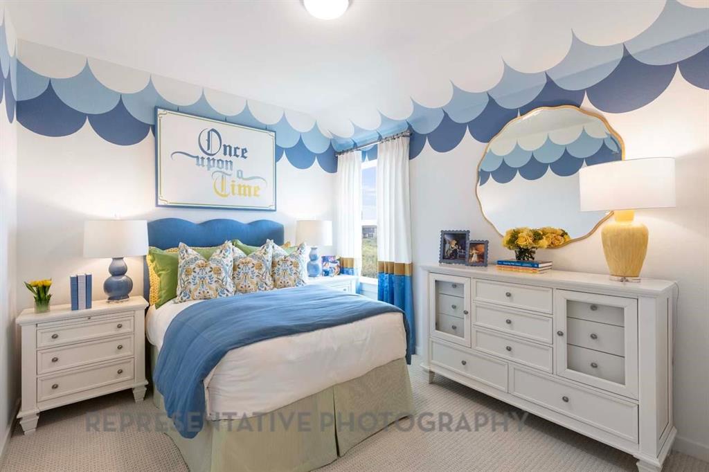 2140 Nerello Way Rockwall, TX 75032 - Photo 31 of 36 a bedroom with a bed and a dresser