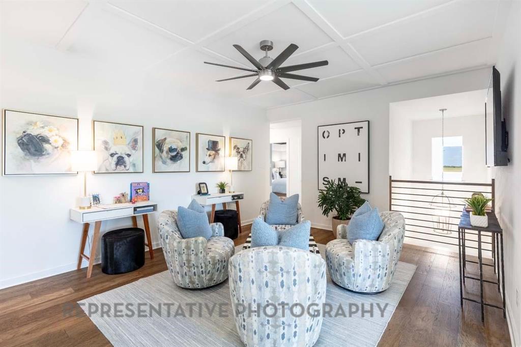 2140 Nerello Way Rockwall, TX 75032 - Photo 33 of 36 a living room with furniture and wooden floor