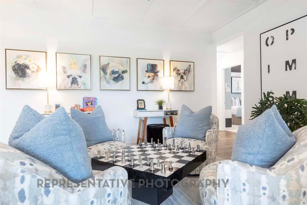 2140 Nerello Way Rockwall, TX 75032 - Photo 34 of 36 a living room with furniture and wall paintings