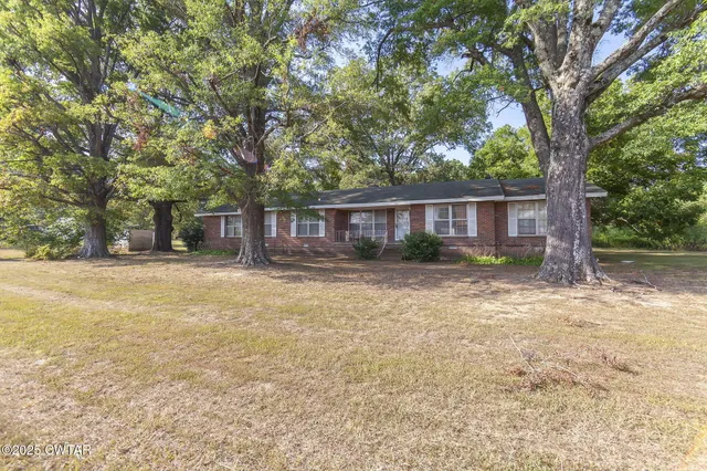 a house view with a outdoor space