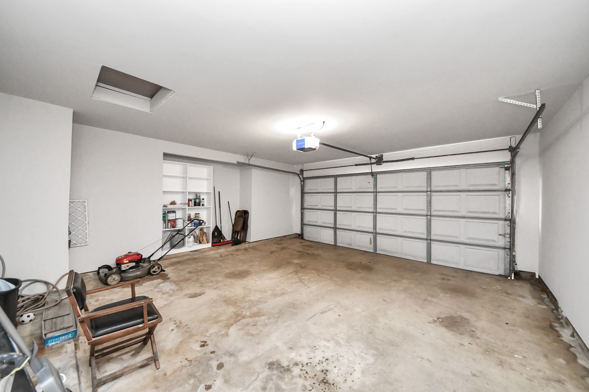 11830 Plumpoint Drive Houston, TX 77099 - Photo 18 of 40 a view of a garage with rack and bicycle