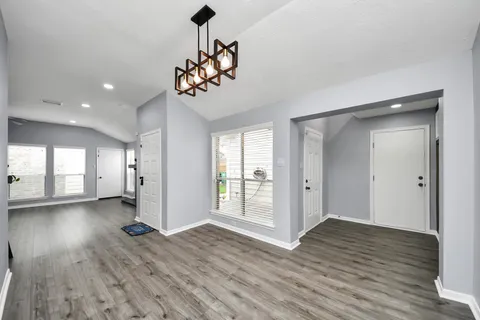 a view of kitchen with wooden floor