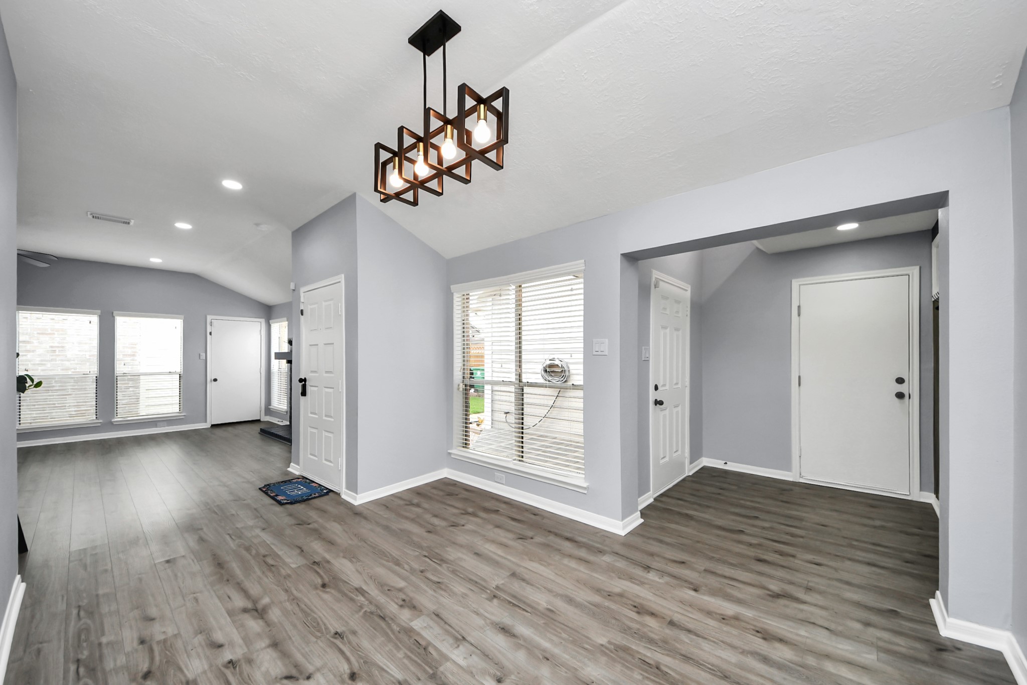 11830 Plumpoint Drive Houston, TX 77099 - Photo 19 of 40 wooden floor in an empty room with a window