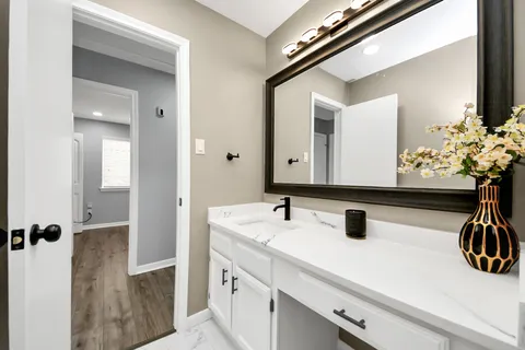 a view of livingroom with hardwood floor and a ceiling fan