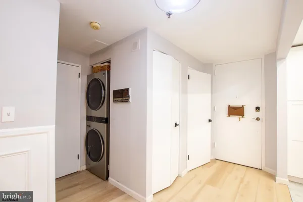 a view of a storage & utility room with washer and dryer