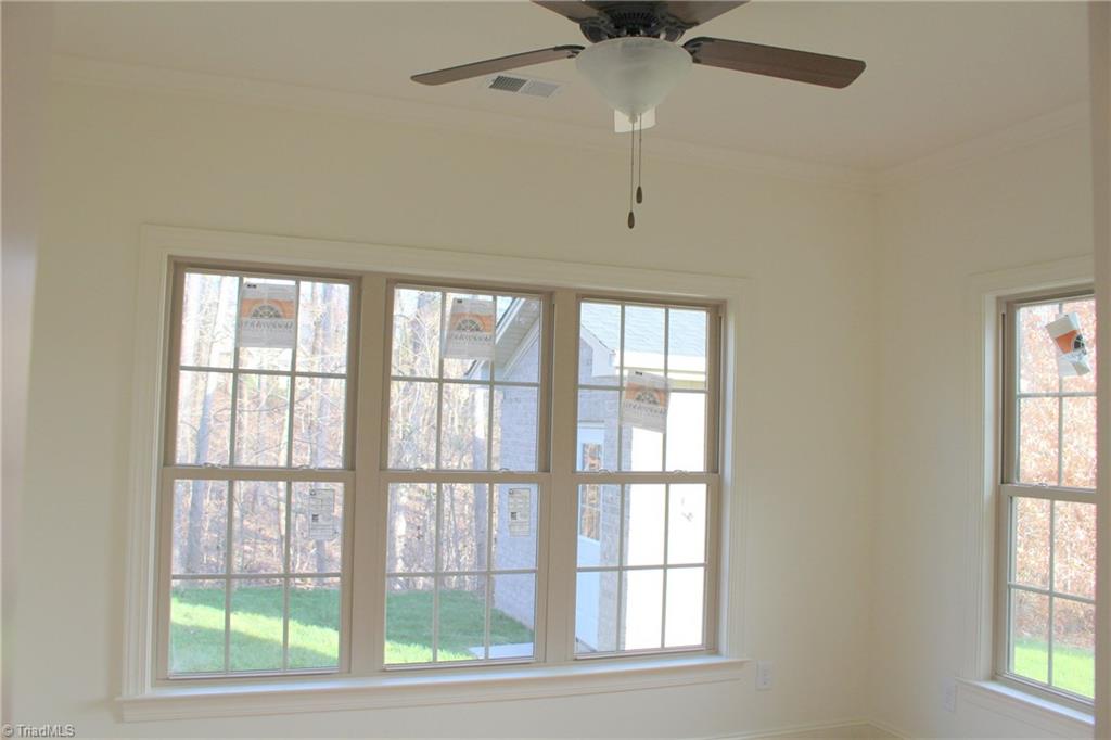 2244 Renaissance Lane High Point, NC 27262 - Photo 13 of 30 Sunroom leads to screened in porch