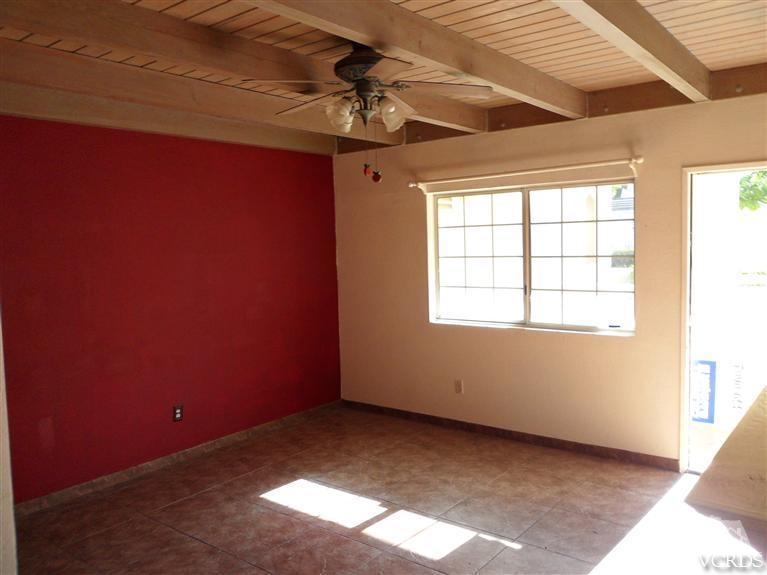 1031 Waltham Road, Unit E Simi Valley, CA 93065 - Photo 5 of 10 a view of an empty room with a window
