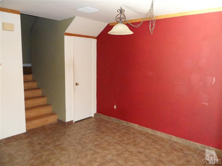 1031 Waltham Road, Unit E Simi Valley, CA 93065 - Photo 8 of 10 a view of a room with staircase and white walls